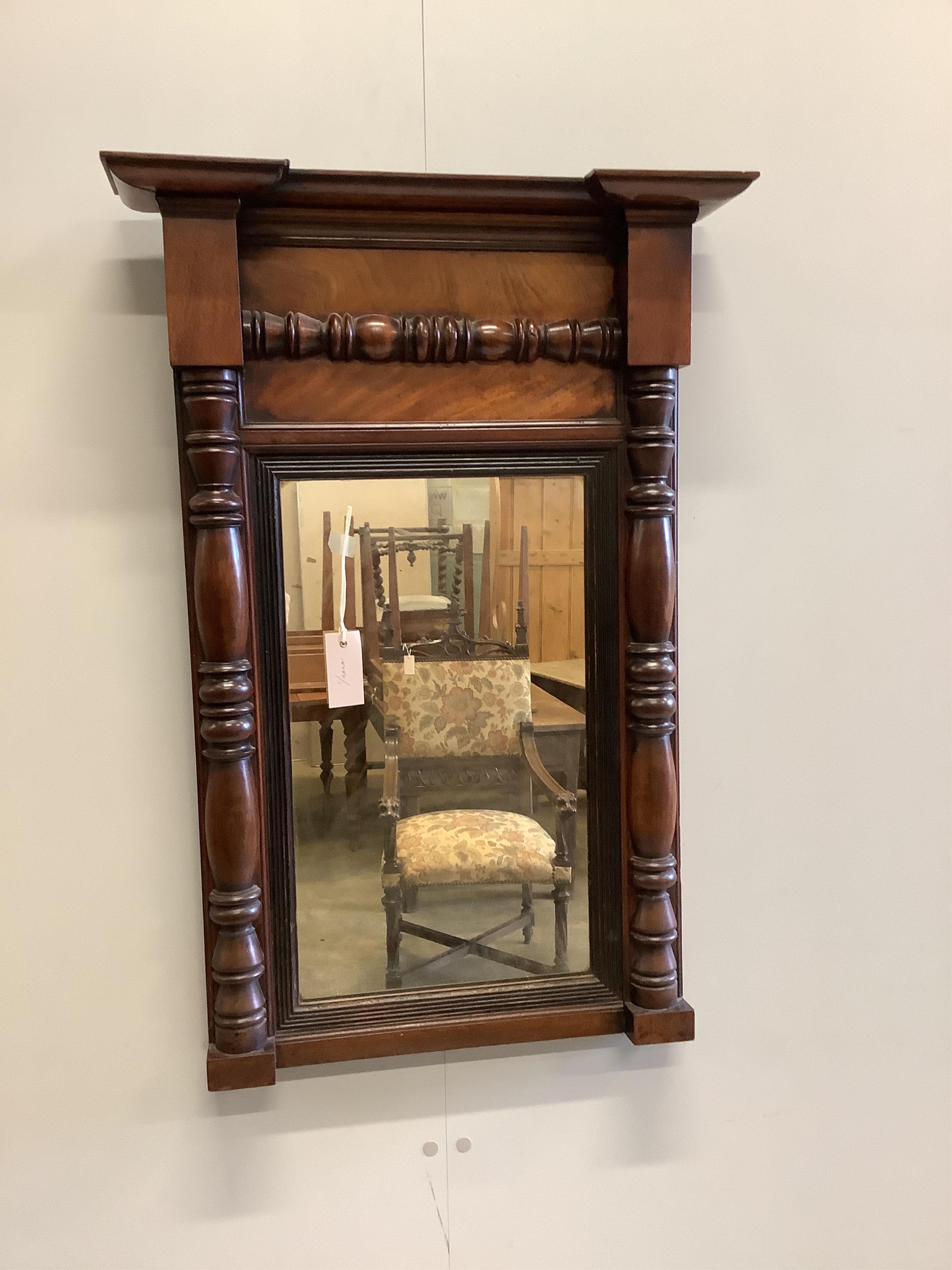 An early Victorian mahogany pier glass, perhaps American, width 56cm, height 81cm. Condition - good